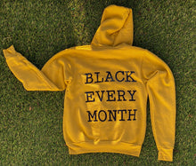 Load image into Gallery viewer, &quot;BLACK EVERY MONTH&quot; (YELLOW HOODIE)
